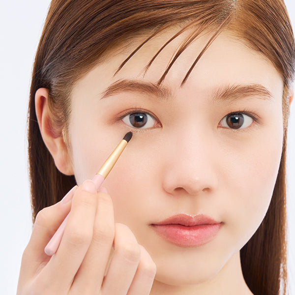 Eye corner brush